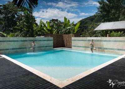 Photo of our pool at Danyasa surrounded by the mountains of Costa Rica