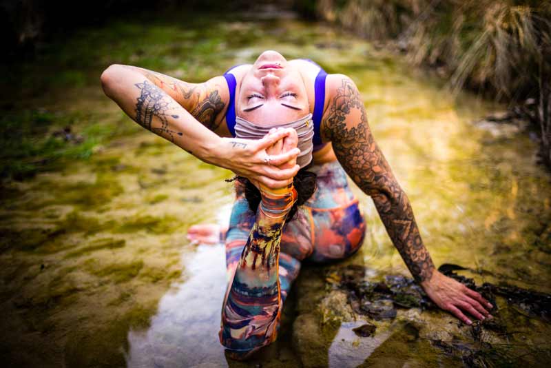 Steph Gongora doing yoga pose at her retreat in Costa Rica