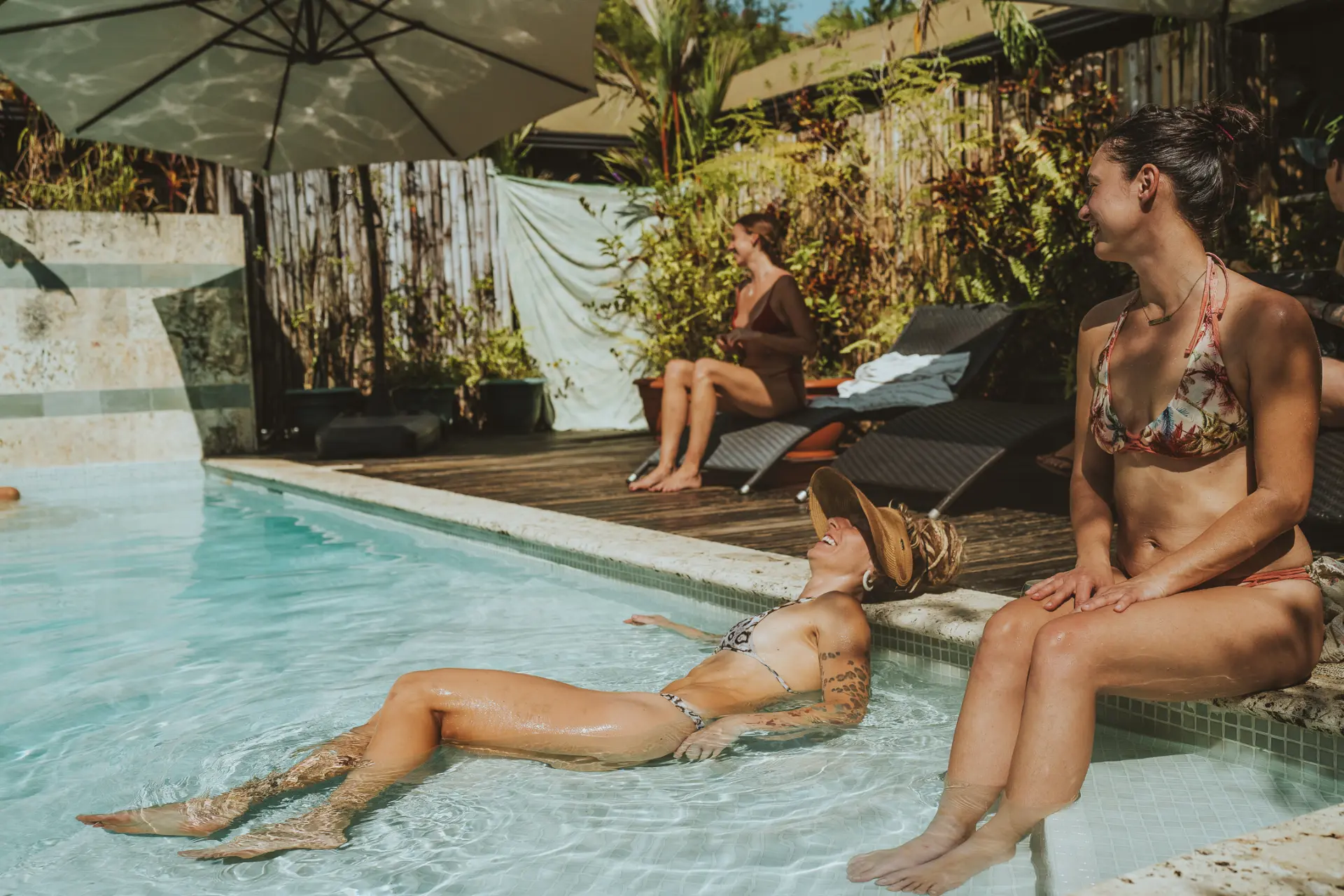 women-relaxing-pool-retreat-center.jpg